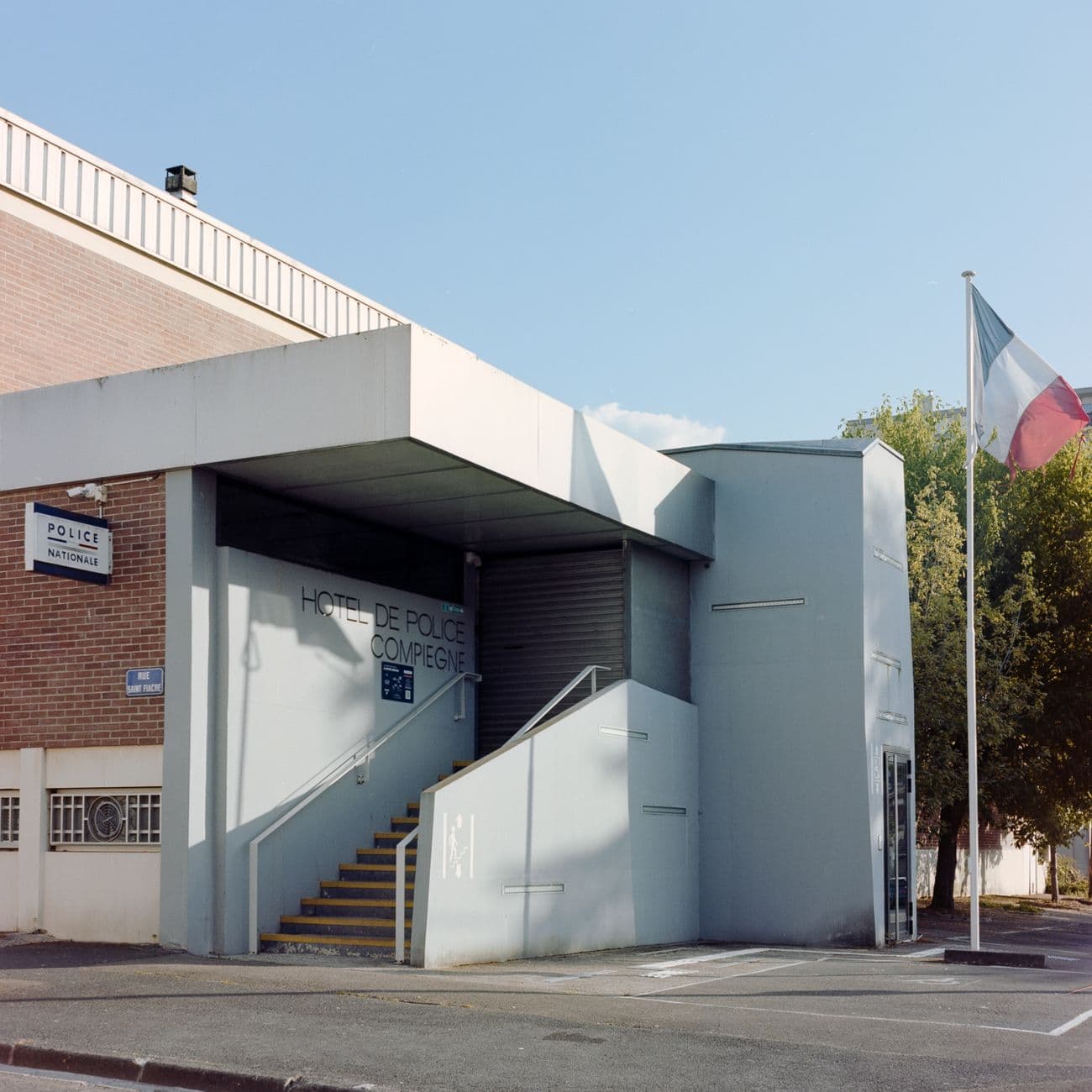 Modern facade of Hôtel de Police in Compiègne, Upper France region.